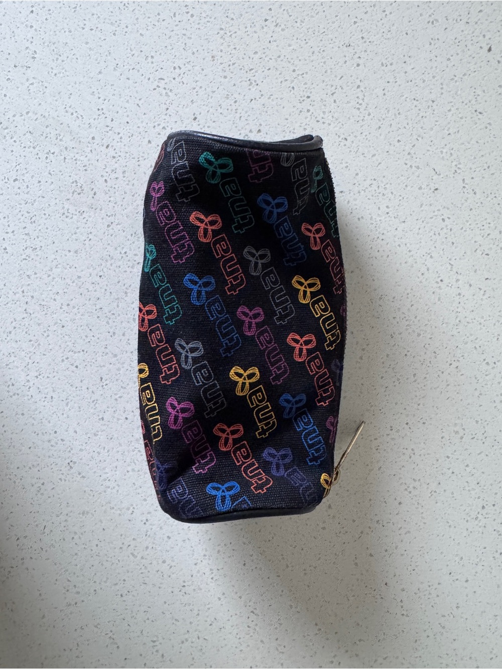 TNA Patterned Cosmetic Pouch in Black & Multicolor